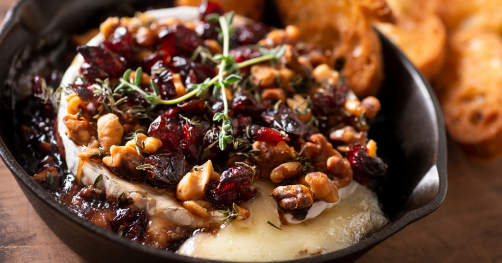 Cast Iron Skillet Baked Brie With Walnuts Cranberries And Thyme